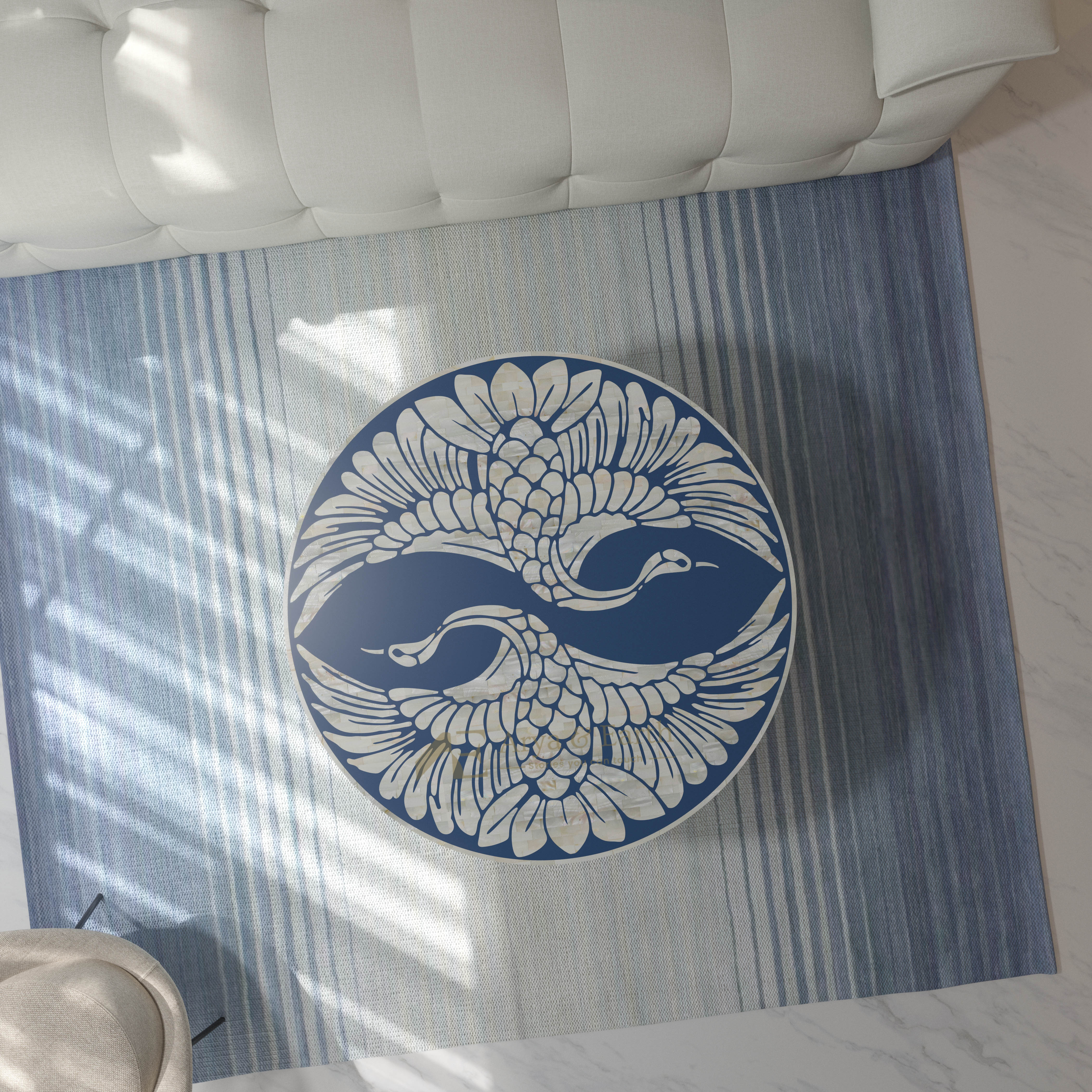 pearl inlay phoenix design coffee table in deep blue colour on a rug