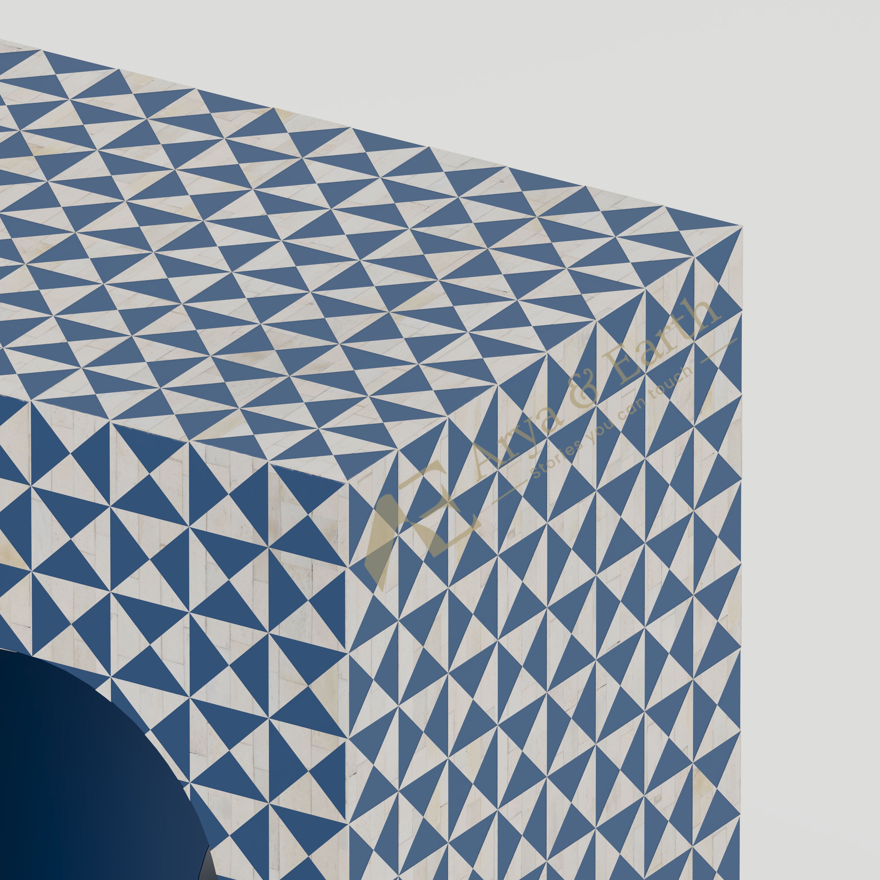 close up of the bone inlay geometric pattern on console table
