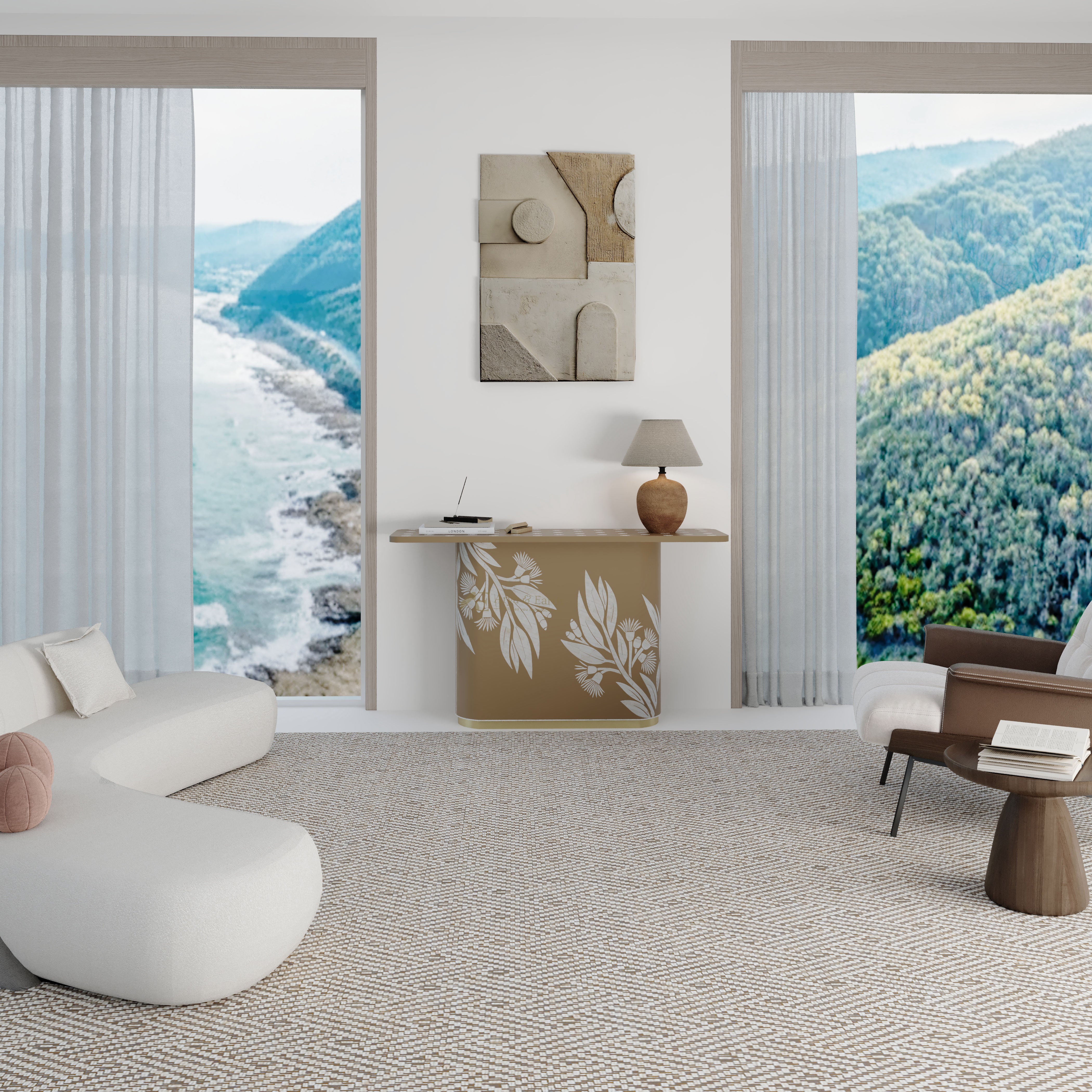 Modern living room with a view of mountains and ocean through large windows.
