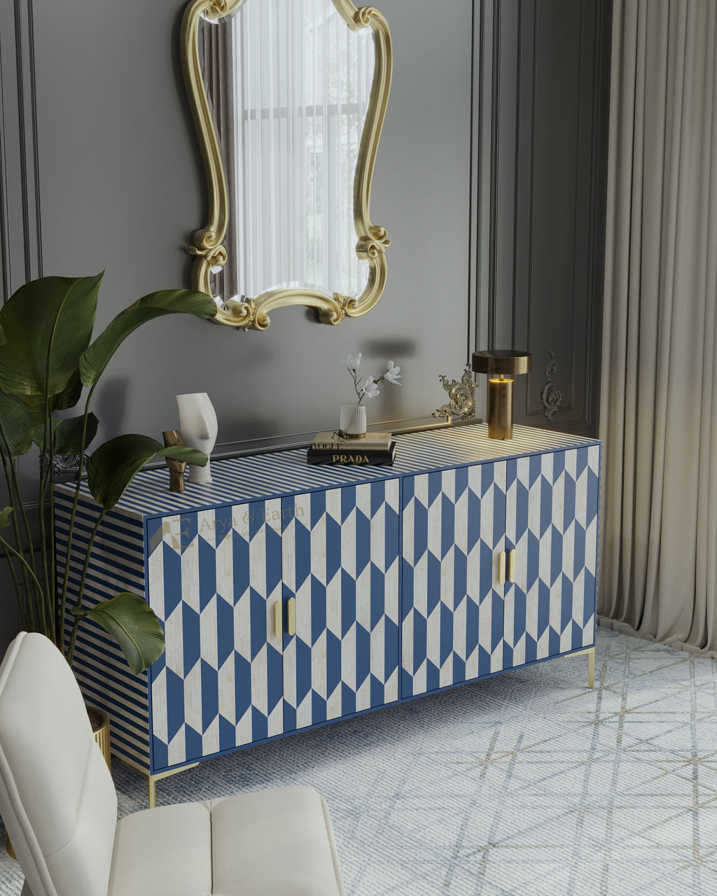 bone inlay blue and white patterned cabinet with a gold-framed mirror in a stylish room.